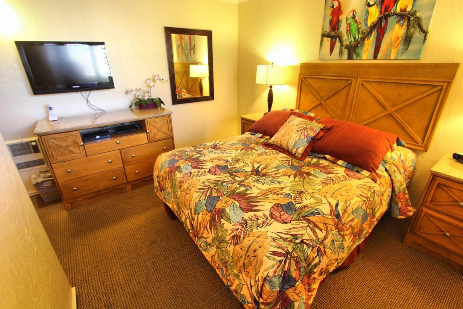 A cozy master bedroom at VRI's Capri by the Sea in San Diego, California.
